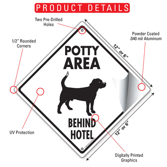 Potty Area with Dog Standing and Behind Hotel Signs or Sticker